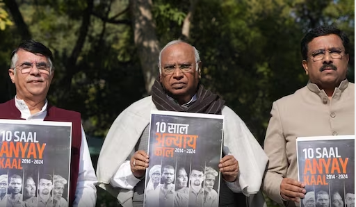 Congress President Mallikarjun releases the black paper against the BJP, during a press conference in New Delhi on February 8.